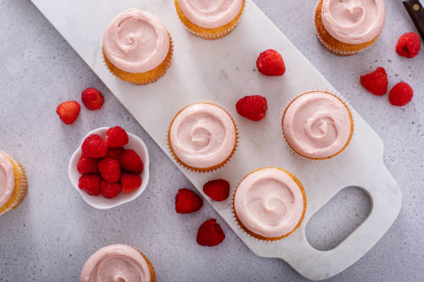 istock Raspberry cupcakes with a swirl of frosting 2149029600
