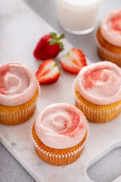 istock Strawberry lemonade cupcakes with a swirl of cream cheese frosting 2149029607