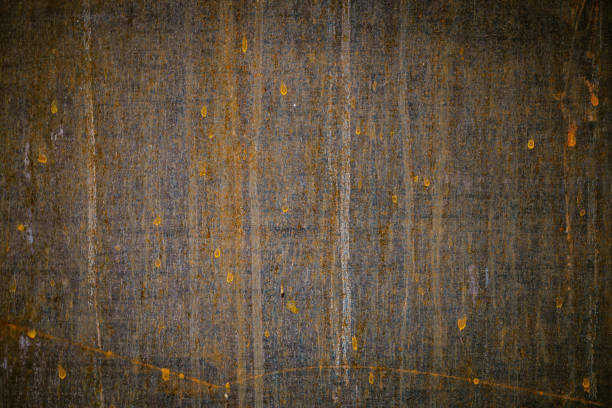 Close-up of rusted weathering steel with scratches and stains