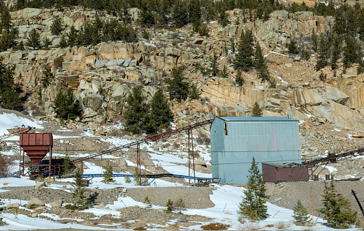 The remains of an old abandoned mining company in Colorado. Image taken on a cold, bright January day.