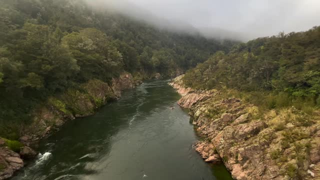 The Buller river flowing through the Upper Buller gorge near the longest swing bridge in New Zealand