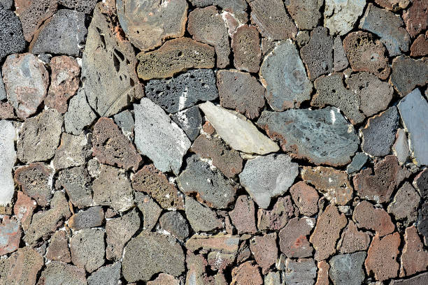 istock A stone wall with a variety of different sized rocks 2149034341
