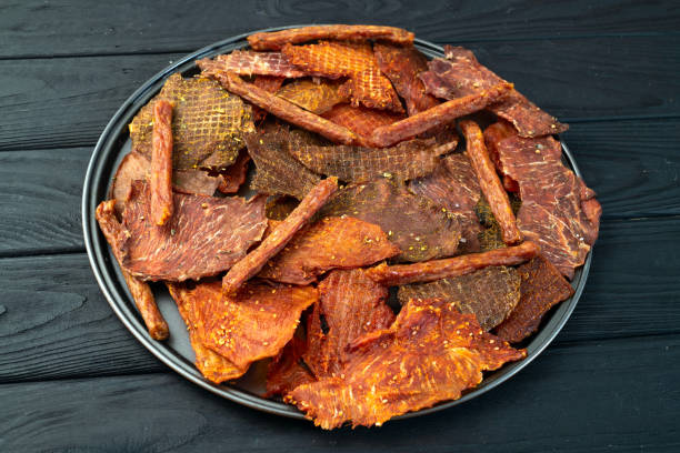 istock Mix of dried meat Jerky . From chicken , beef and pork. 2149035022