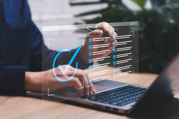 istock Quality Control QC, Quality Assurance QA, Management standardization system concept, Businessman use laptop checklist and evaluation to issue a certificate document for international ISO standards 2149035284