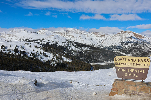 View of Loveland Pass with Continental Divide sign.  Image was taken on a very sunny, January day.