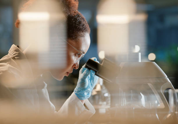 istock Medicine, microscope and sample with woman scientist in laboratory for breakthrough or research. DNA, innovation or science and young medical engineer with test specimen in lab for clinical study 2149039462