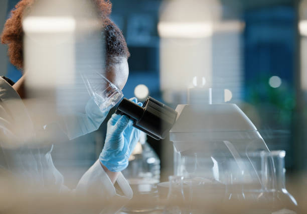 istock Biology, microscope and sample with woman scientist in laboratory for breakthrough or research. Experiment, innovation or science and medical engineer with test specimen in lab for clinical study 2149039464