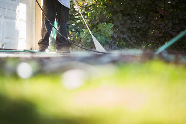 istock Man Pressure Washing His Home Driveway 2149039905