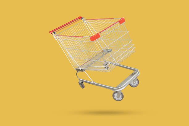 istock shopping cart isolated on yellow background 2149040610