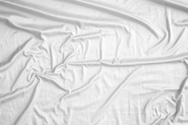 istock Abstract white wrinkled bedding sheet fabric texture background 2149040638
