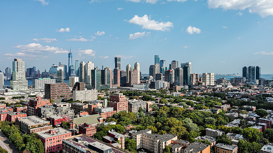 Jersey City cityscape with Hamilton Park, offers perspective of Downtown Manhattan skyline with the Hudson River waterfront