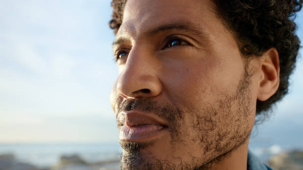 istock Face, man and thinking at beach with peace or relax on day off, vacation and leisure. Reflect, holiday and memories on break, chill and self care in Brazil to refresh for wellbeing or mental health 2149042993