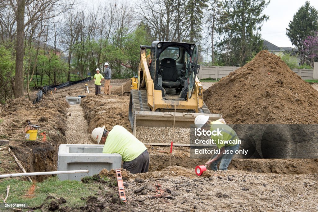 Aggregate Workers Construction Workers Work In Aggregate In Drainage Trench Stock Photo ...