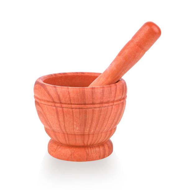 istock Wooden pattern mortar with pestle on white background. 2149050279