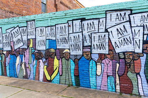 Memphis Tennessee - April 7 2024: Mural of the Memphis Civil Rights Protest By African American Workers on a Brick Wall