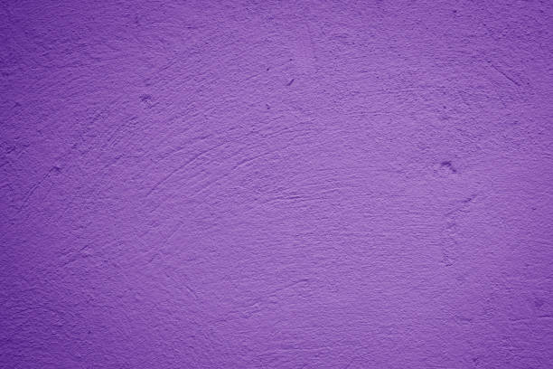 istock purple textured wall background with dark side 2149055188