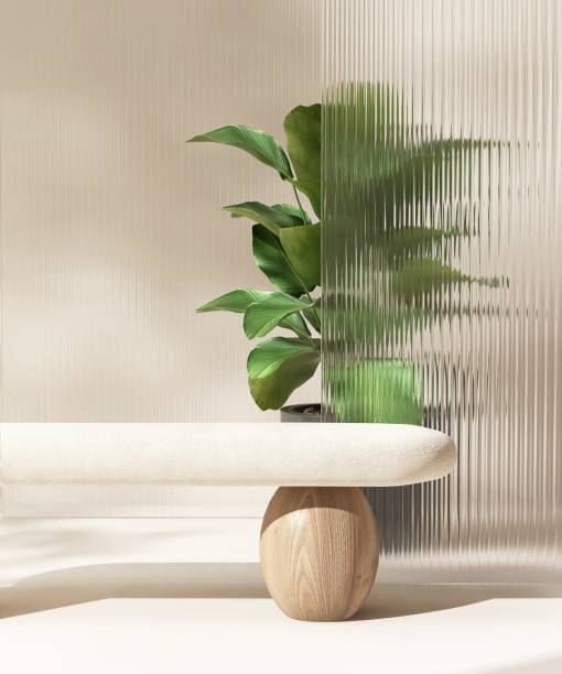 istock Modern, cute blank cream table podium, tropical tree, reeded glass in sunlight, leaf shadow on green wall 2149057387