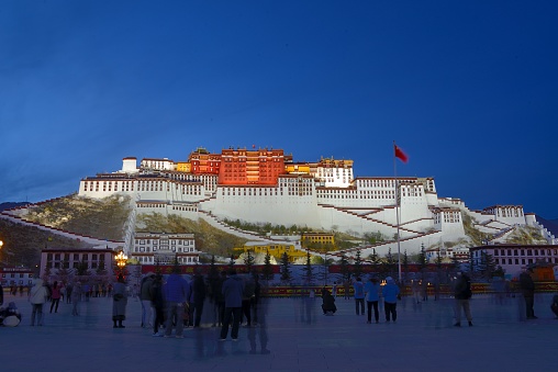 the Potala Palace at night, seen from the Square. Lhasa, Tibet Autonomous Region, China.