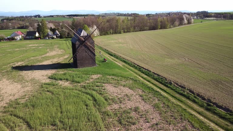 Nové Dvory, Bílovec, Nový Jičín District, Czech Republic - A Vintage Windmill Stands Tall Amidst the Peaceful Rural Scenery - Aerial Drone Shot