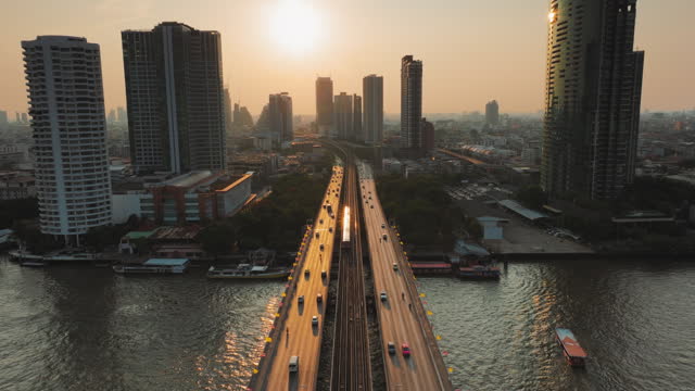 Aerial view thailand capital city Bangkok landscape Chao Phaya River  at golden sunset