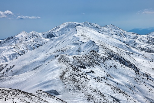 The snow-covered ridgeline from Mt. Makihata to Mt. Tanigawa in Japan