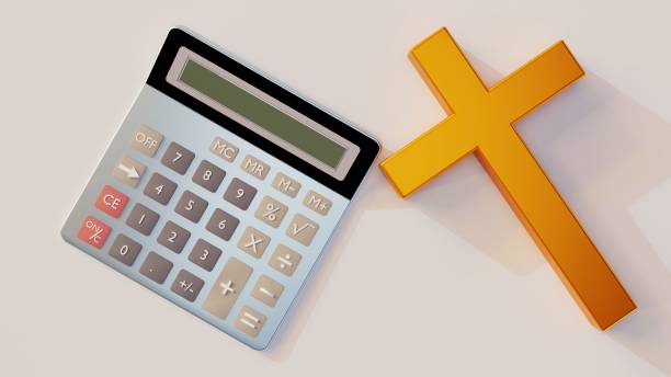 a calculator and gold cross on the white background