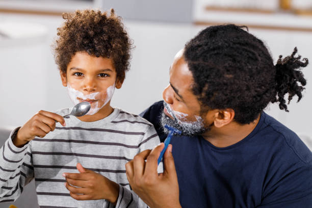 istock I am shaving just like my dad! 2149063947