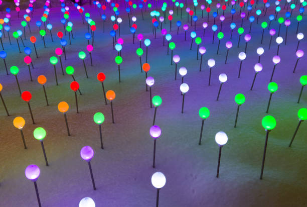 istock Multi-colored lanterns on the snow in the park as an abstract background. Texture 2149064936