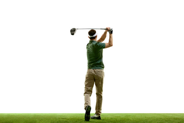back view portrait of golfer in retro outfit with golf club taking shot against white studio background. Male golf player on golf course. back view portrait of golfer in retro outfit with golf club taking shot against white studio background. Male golf player on golf course. Concept of sport, luxury games, active lifestyle, action. Ad golfer swinging club stock pictures, royalty-free photos & images