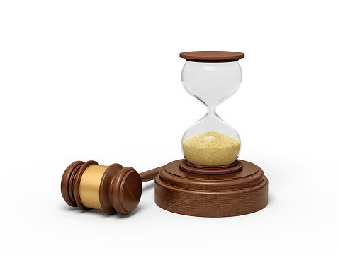 3d rendering of hourglass standing on sounding block with gavel lying beside. Running out of time. Time to pass sentence. Commutation of sentence.