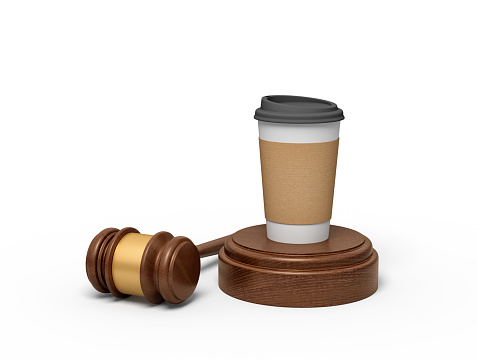 3d rendering of paper coffee cup standing on sounding block with gavel lying beside. Trade and justice. Consumer law. Customers suit manufacturer.