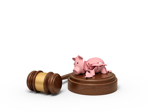 3d rendering of pieces of broken piggy bank lying on sounding block with gavel beside. Lose case. Lawsuit for money. Financial difficulty.