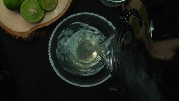 istock Macro. A top-down view of a refreshing margarita with lime slice. Comestible. 2149069216