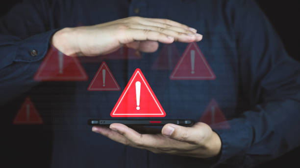 istock Emergency warning alert alarm on Smartphone, Data network protection, Virus alarm. 2149070215