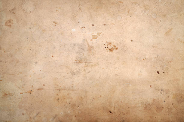 istock stained and marked vintage paper background texture, aged 2149070293