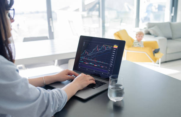 istock Young woman trading online. 2149073227
