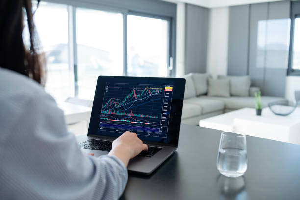 istock Young woman trading online. 2149073228
