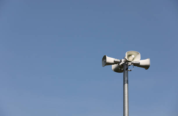 istock Whire horn speaker in the park with clear blue sky background. 2149074741