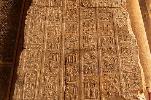 Wall of egyptian hieroglyphs at the Temple of Horus, Edfu.Esna and Aswan in Egypt.
