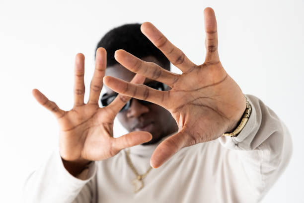 istock Studio portrait of black man gesturing with hands against white background 2149076191