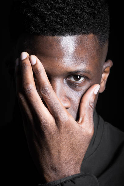 istock Intense portrait of a black man with a pensive expression in a studio setting 2149076408