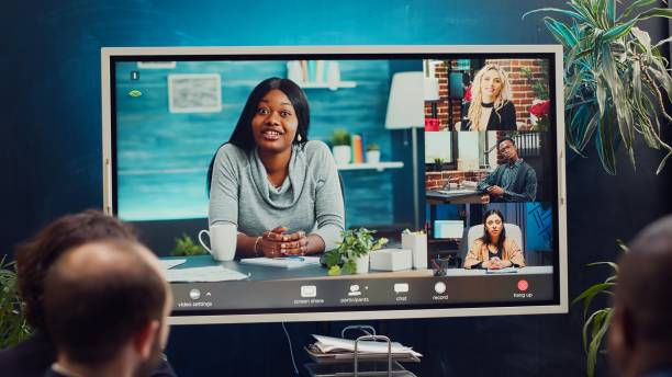 istock Project management team attending videocall meeting with shareholders 2149076865