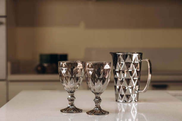 istock Empty Glasses and Wine Carafe in Stylish Modern Kitchen 2149077009