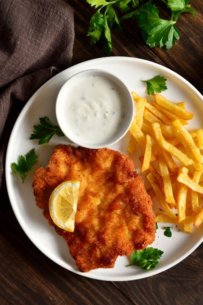 istock Wiener schnitzel with potato fries. Top view, flat lay 2149077923