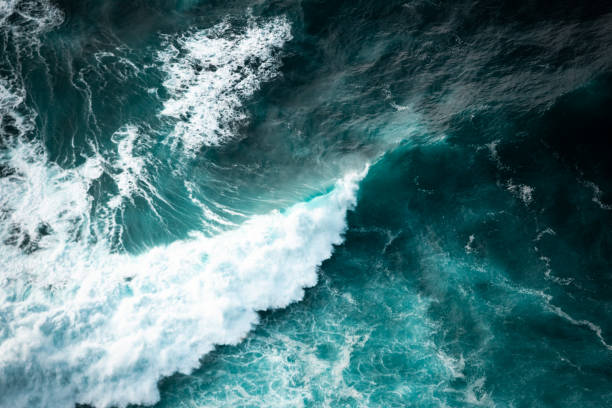 istock Ocean waves crashing, top down aerial drone view. Storm on sea or ocean 2149078311