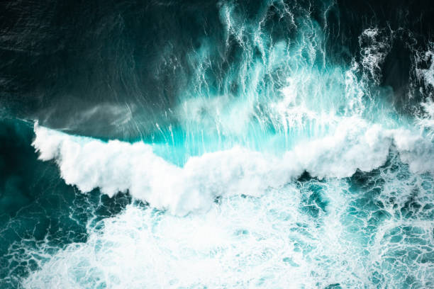 istock Ocean waves crashing, top down aerial drone view. Storm on sea or ocean 2149078435