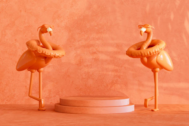istock Summer podium showcase product presentation with inflatable flamingo and palm tree shadows on orange color background 2149078630