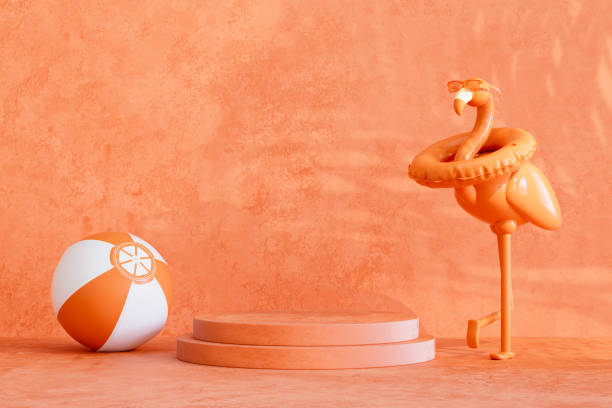 istock Summer podium showcase product presentation with inflatable flamingo and palm tree shadows on orange color background 2149078678