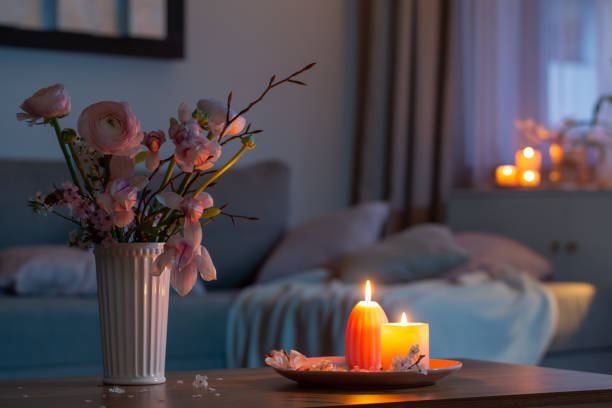 istock home interior with spring flowers and burning candles 2149078950