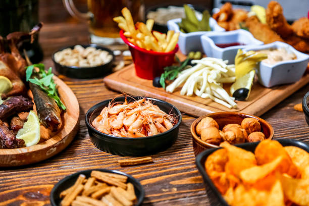 istock Wooden Table Displaying Assorted Food Bowls 2149079119